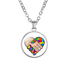Load image into Gallery viewer, Autism Red Ribbon Puzzle Pendants Cabochon Glass Dome Necklace New Arrival Caring theme Handmade Long Chains Necklaces Jewelry